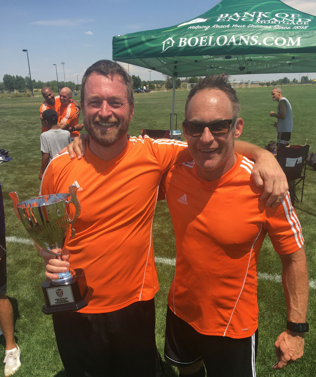 BOE Bombers: Featured: Scott Sax (left) and Mark Guenther (right), two BOE members on the Bombers Team holding Colorado State Cup